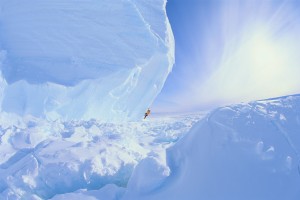 Man Climbing an Iceberg