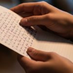 Hands holding a letter